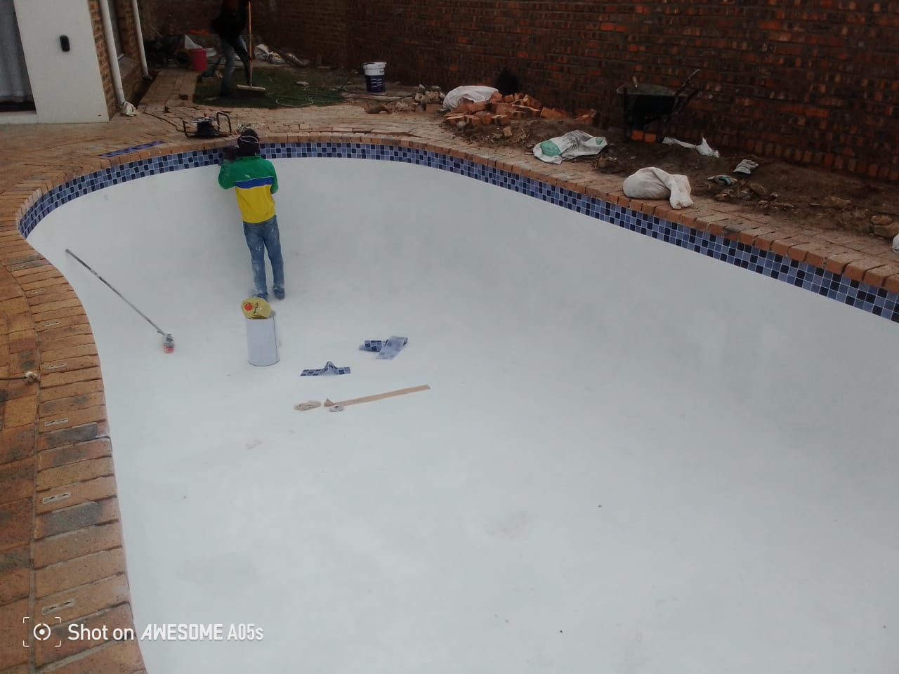 Professional pool technician at work